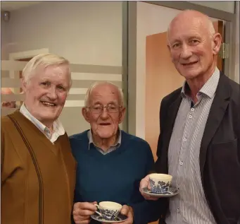  ??  ?? Michael O’Reilly and Larry Dunne enjoying a cuppa with Kilkenny manager Brian Cody at the official opening of St Canice’s Credit Union in Graiguenam­anagh.