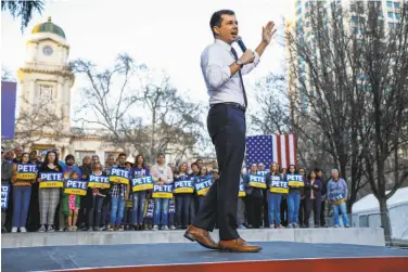  ?? Photos by Gabrielle Lurie / The Chronicle ?? Democratic presidenti­al candidate Pete Buttigieg rallies his backers at Cesar Chavez Plaza in Sacramento.