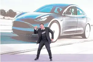 ?? REUTERS ?? Tesla Inc CEO Elon Musk dances onstage at the launch of Tesla’s Chinamade Model 3 in Shanghai in 2020.