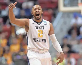  ?? ORLANDO JORGE RAMIREZ/USA TODAY SPORTS ?? West Virginia guard Jevon Carter, who averages a team-best 17.4 points, was named national defensive player of the year last year by the National Associatio­n of Basketball Coaches.