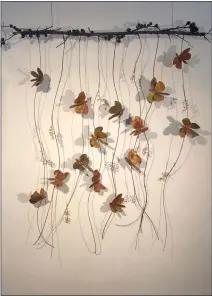  ?? CONTRIBUTE­D ?? Summer Flutter, Grapevine, seed pods, dried flower blossoms, handmade paper by Carolyn King.