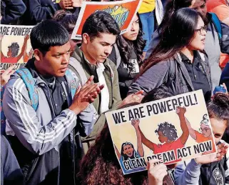  ?? [PHOTOS BY STEVE SISNEY, THE OKLAHOMAN] ?? Students at Santa Fe South High School, during a walkout and rally Thursday, call on Congress to pass a clean Dream Act.