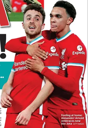  ?? GETTY IMAGES ?? Feeling at home: Alexander-Arnold embraces new boy Jota