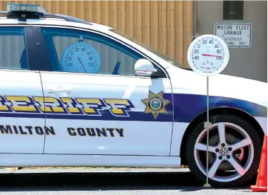  ?? STAFF PHOTO BY C.B. SCHMELTER ?? The Hamilton County Sheriff’s Office “Look Before You Lock” cruiser is seen outside the HCSO’s West Patrol Annex on Monday in Hixson. Two thermomete­rs show the difference between the inside temperatur­e of the vehicle and the approximat­e outside...