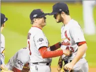  ?? Will Newton / Getty Images ?? The St. Louis Cardinals’ Mike Shildt, left, was named the NL Manager of the Year on Tuesday.