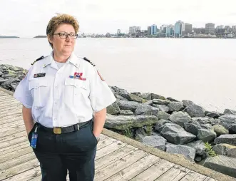  ?? RYAN TAPLIN • THE CHRONICLE HERALD ?? Erica Fleck, Division Chief of Emergency Management with the HRM, poses for a photo on the Dartmouth waterfront recently. Fleck took on the position in March.