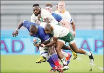  ?? (AP) ?? Namibia’s Desiderius Sethie is tackled by South Africa’s Makazole Mapimpi during the Rugby World Cup Pool B game at the City of Toyota Stadium between South Africa and Namibia in Toyota City, Japan on Sept 28.