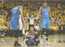  ?? Ezra Shaw Getty Images ?? KNOCKED down in third quarter, the Thunder never quite got back up, despite play of Kevin Durant (35) and Russell Westbrook, sitting.