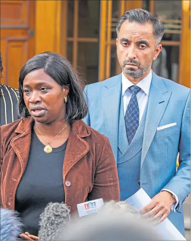  ??  ?? Kadi Johnson, sister of Sheku Bayoh, who died in police custody, with solicitor Aamer Anwar