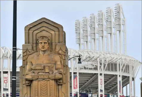  ?? Jason Miller/Getty Images ?? The Guardians of Traffic sculptures on the Hope Memorial Bridge near Progressiv­e Field are the inspiratio­n for the renaming of the Cleveland Indians to the Cleveland Guardians at the end of the 2021 season.