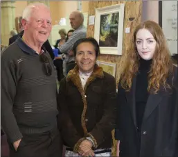  ??  ?? Ray and Maria Teresa Keogh with Jade Butler, who facilitate­d the exhibition.