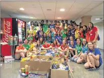  ?? SUBMITTED ?? Helping others and being socially conscious is just one of the multitude of lessons participan­ts learn while taking part in the SHAD program. The 2017 participan­ts conducted a door-to-door food drive.