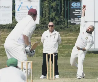  ??  ?? Easington’s Omar Shahid bowls to Seaham Park opener Adran Hedley last week. Picture by Kevin Brady.