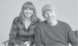  ??  ?? Bryce Dallas Howard and Ron Howard are featured in “Dads,” premiering Friday on Apple TV+.