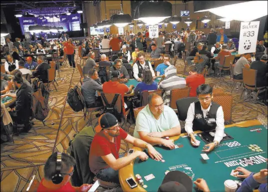  ?? Erik Verduzco Las Vegas Review-Journal @Erik_Verduzco ?? Players compete in the $565 buy-in “Colossus” No-limit Texas Hold ’em tournament Saturday at the Rio, part of the 49th annual World Series of Poker. This year’s WSOP has a record 78 events and runs through mid-July.