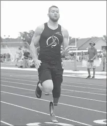  ?? NWA Democrat-Gazette/BEN GOFF • @NWABENGOFF ?? Cody Johnson of Bigelow runs in the 100-meter dash Thursday during the Never Say Never Foundation’s Battle of the Blades at the McDonald’s Relays at Fort Smith Southside. The meet was Johnson’s second after returning to running, on a new prosthetic...