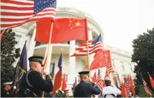  ?? Andrew Harnik / Associated Press ?? A military honor guard awaits the arrival of President Obama and Chinese President Xi Jinping at the White House.