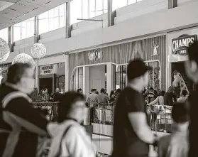  ?? Pu Ying Huang / Staff file photo ?? Shoppers wait in long lines to attend the grand opening of the Toys R Us store at the Galleria on Dec. 7, 2019. The chain shuttered this and another in New Jersey.