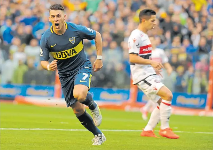  ?? JORGE SANCHEZ ?? La boca llena de gol. Cristian Pavón ya anotó con un derechazo bajo e inicia el festejo. Fue el único tanto de la tarde, concretado cuando el partido recién arrancaba.