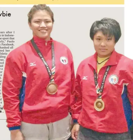  ??  ?? MEDALISTS. Women's judo bronze medalist Sydney Tancontian of Davao City, left, poses with gold medalist Filipino-Japanese Mariya Takahashi at the close of the 29th Southeast Asian (SEA) Games judo competitio­n at the Kuala Lumpur Convention Center in...