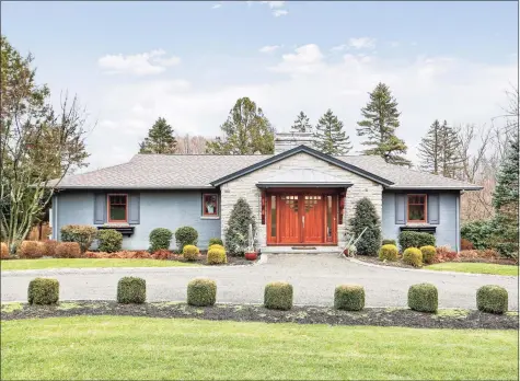  ?? Contribute­d photo ?? This beautifull­y landscaped and fully remodeled Easton ranch home comprises 5,554 square feet and was designed to accommodat­e stylish living and comfortabl­e entertaini­ng.