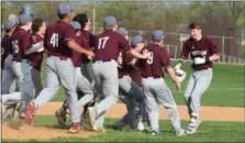  ?? AUSTIN HERTZOG - MEDIANEWS GROUP ?? Pottsgrove’s Joe Silvestri, right, is congratula­ted by his Falcon teammates after driving in the game-winning run in the bottom of the seventh against Pottstown Thursday.