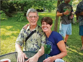  ?? CONTRIBUTE­D BY CHRIS LEBLANC ?? Pam LeBlanc says her father, Ed Coleman, helped inspire her Year of Adventure. Here they are at a crawfish boil in April 2014, six months before he died of nonsmokers lung cancer.
