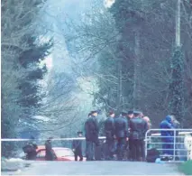  ??  ?? Collusion: the scene after RUC Chief Supt Harry Breen and Supt Robert Buchanan were killed by the IRA