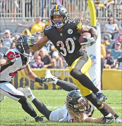  ?? Peter Diana/Post-Gazette ?? James Conner registered five 100-yard games, including four in a row at midseason.