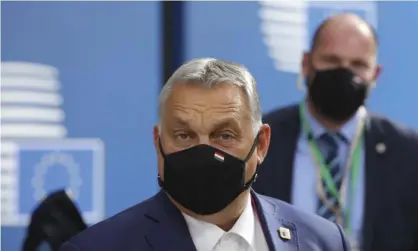  ?? Photograph: Olivier Matthys/AP ?? Hungary’s prime minister, Viktor Orbán, arrives for an EU summit at the European council building in Brussels on 15 October.