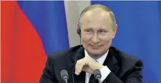  ?? YURI KADOBNOV/THE ASSOCIATED PRESS ?? Russian President Vladimir Putin listens to a question at a joint news conference in Sochi, Russia on Wednesday. The Venezuelan Foreign Ministry announced Friday, that Putin had promised to start delivering food after speaking on the phone with...