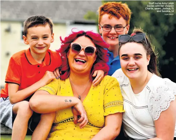  ??  ?? Staff nurse Amy Leigh Davies with her children Charlie, seven, Joshua, 15 and Sasskia, 14 Gayle Marsh