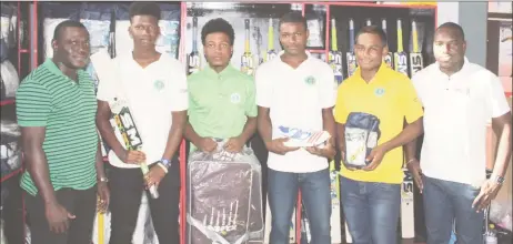  ??  ?? DCC’s quartet; Left-arm spinner Ashmead Nedd [captain], Alphius Bookie [all-rounder] fast bowler Qumar Torrington and all-rounder Sachin Singh and with second vice-president Laurence Smith [extreme right] and Leading Edge Representa­tive John Cush...