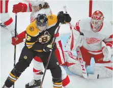  ?? STAFF PHOTO BY CHRIS CHRISTO ?? STAKING HIS POSITION: David Backes battles with the Red Wings’ Libor Sulak during last Saturday’s game at the Garden.