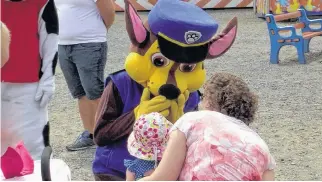  ?? ?? A child says hello to their favourite Paw Patrol characters at the South Shore Exhibition in Bridgewate­r.
