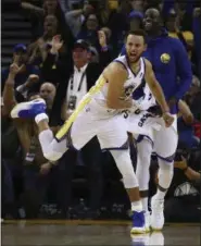  ?? BEN MARGOT —ASSOCIATED PRESS ?? The Warriors’ Stephen Curry celebrates a score against the Nuggets on Jan. 8.