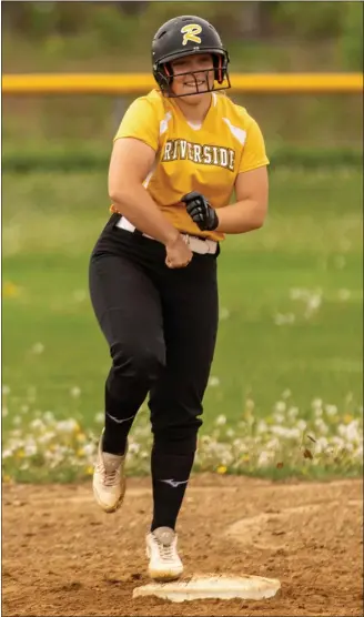  ?? BARRY BOOHER — FOR THE NEWS-HERALD ?? Emily Lamos of Riverside celebrates one of her two RBI doubles in the Beavers’ win over South on May 4.