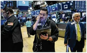 ?? DREW ANGERER / GETTY IMAGES ?? At one point Thursday afternoon, the Dow Jones Industrial Average was down more than 440 points — but that was a drop of less than two percent of the overall market.