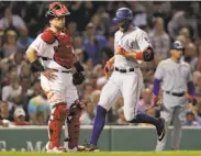  ?? Charles Krupa / Associated Press ?? Texas’ Hunter Pence crosses home plate during his sixth-inning inside-the-park home run.