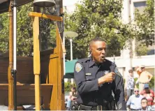  ?? David Paul Morris / Special to The Chronicle 2010 ?? San Francisco police Officer Carl Payne, at Union Square in 2010, demonstrat­es the cable car bellringin­g style that made him a 10time champion of the annual competitio­n.