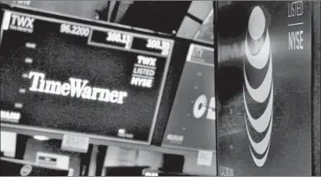  ?? Richard Drew Associated Press ?? JUSTICE Department lawyers didn’t seek an emergency stay of U.S. District Judge Richard Leon’s June 12 ruling that allowed AT&T to buy Time Warner. But they filed a one-sentence notice of appeal Thursday.