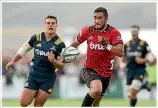  ?? PHOTO: GETTY IMAGES ?? Crusaders halfback Bryn Hall scored his team’s second try in Waimumu last night.