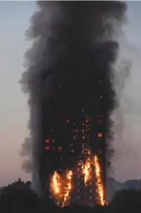  ??  ?? FLAMES AND SMOKE BILLOW from the Grenfell Tower apartment block in West London in June.