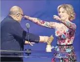  ?? Alberto E. Rodriguez Getty Images ?? QUINCY JONES and Brass Ring Award recipient Jane Fonda at the Carousel of Hope Ball.