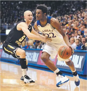  ?? JOHN RIEGER, USA TODAY SPORTS ?? Kansas freshman guard Andrew Wiggins had 16 points, three rebounds and three steals in his first collegiate game. Wiggins is part of a deep and highly touted freshman class in college basketball this season.