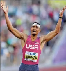  ?? Ashley Landis Associated Press ?? MICHAEL NORMAN, a former Vista Murrieta and USC standout, allows a wide smile after winning the final of the men’s 400 meters.