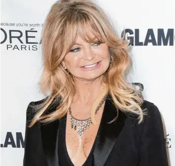  ?? Fotos: dpa ?? Die diesjährig­e Opernball Begleiteri­n von Richard Lugner ist eine kleine Sensation. Goldie Hawn ist Hollywood Star und Oscar Preisträge­rin. Da drängt sich die Frage auf: Hat die das nötig?