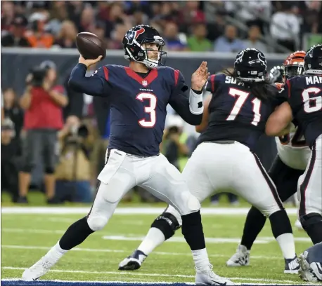  ?? THE ASSOCIATED PRESS FILE ?? Then-Houston Texans quarterbac­k and Cardinal O’Hara graduate Tom Savage, left, seen during a 12-10win over Cincinnati on Christmas Eve of 2016that earned an AFC South crown. Savage, the Pitt product taken in the fourth round in 2014, is the last Delco player to be selected in an NFL Draft.