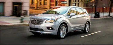  ?? (Buick/TNS) ?? Buick’s popular Envision five-passenger compact SUV gets more power and lower prices for 2019.