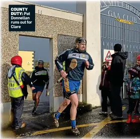  ??  ?? COUNTY DUTY: Pat Donnellan runs out for Clare